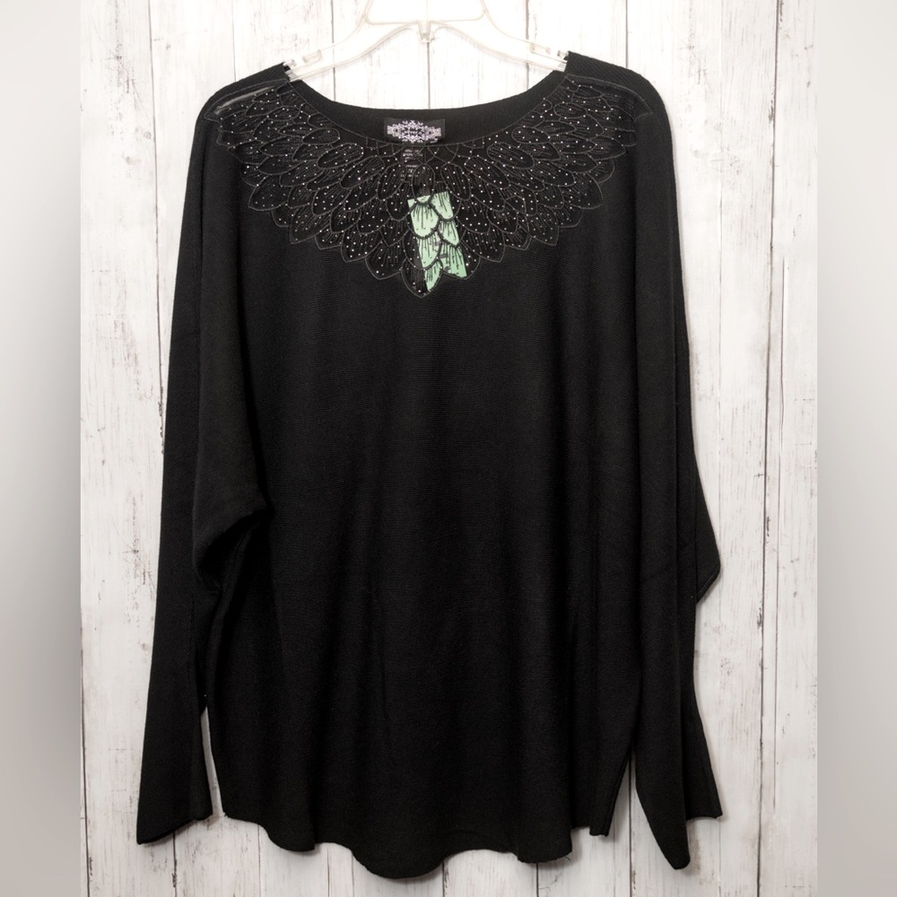 NWT Black beaded sweater with sheer neckline. 
Beautiful detail.